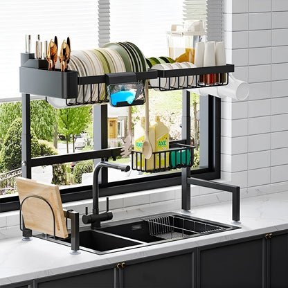 Black metal retractable sink draining rack extended on kitchen countertop