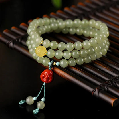Pale blue Hetian jade bracelet with 6mm beads in three-circle design