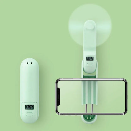Folding mini fan in green, pink, or white with collapsible design and USB charging port