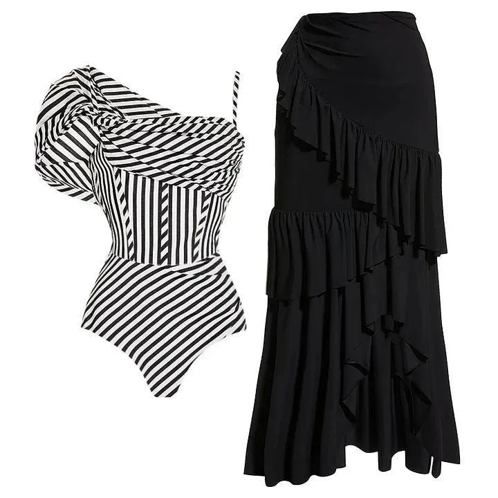 Women's striped one-piece swimsuit with ruffled design and black skirt overlay