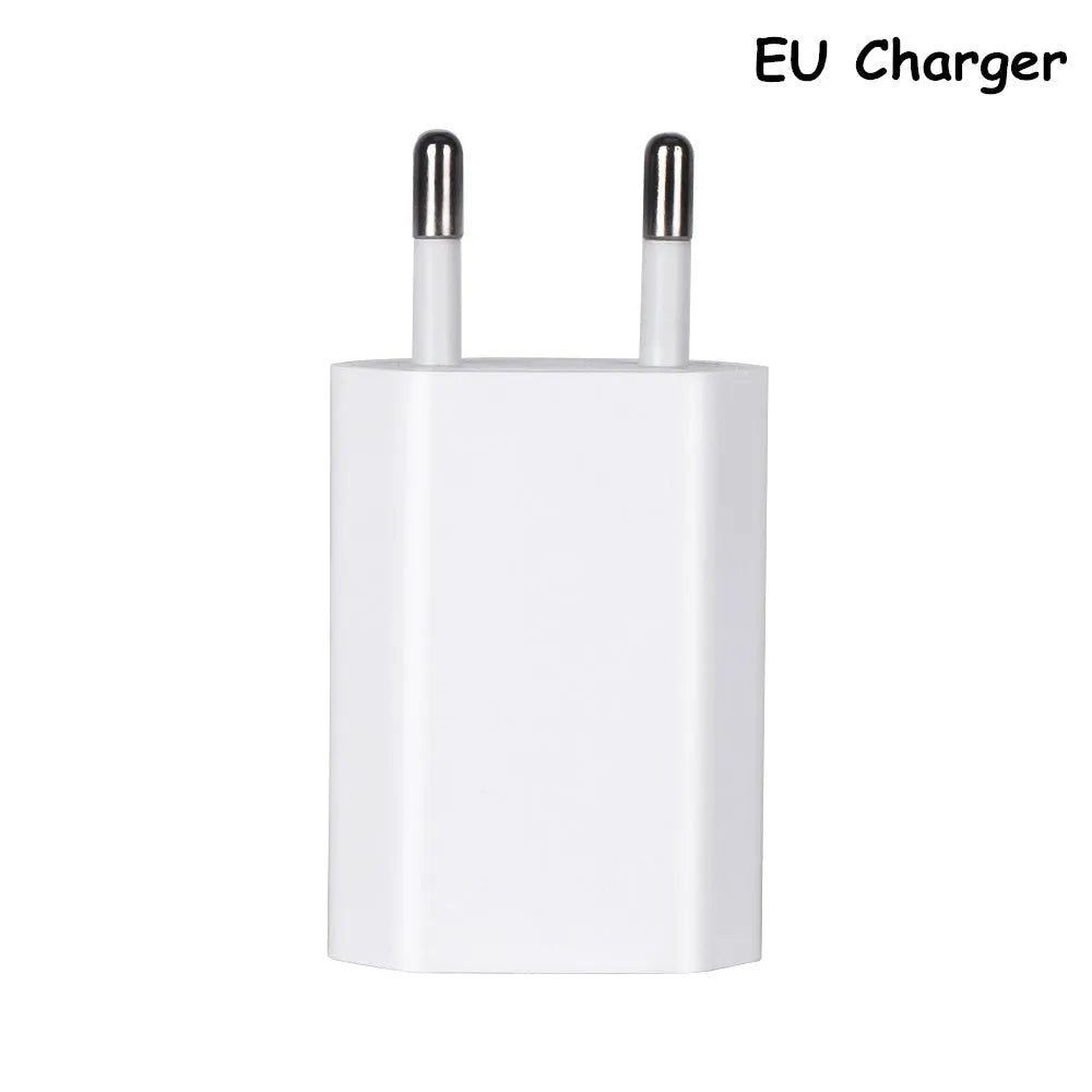 White USB travel charger with UK plug and a coiled Lightning cable for iPhone and iPad charging