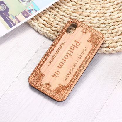 Wooden iPhone case with laser-carved floral design and flexible TPU bumper in natural wood finish.