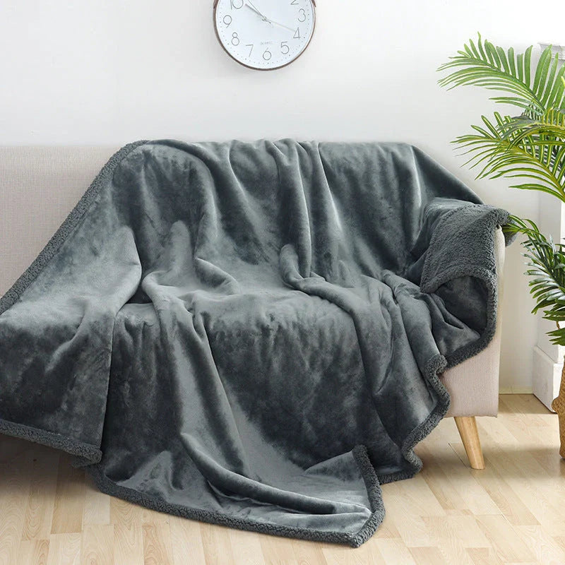Cozy flannel dog blanket with soft sherpa accents for all-season comfort and warmth