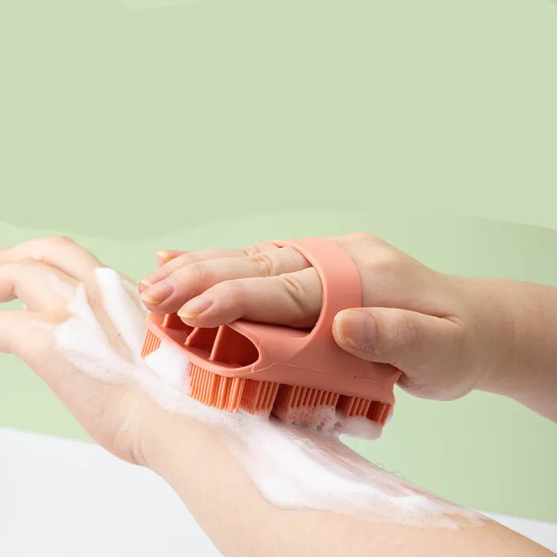 Silicone scalp massager shampoo brush with long bristles and ergonomic handle in assorted colours.