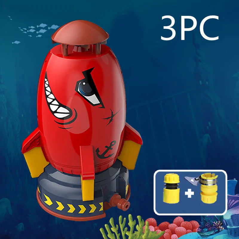 Yellow outdoor water pressure rocket launcher toy for kids on a green lawn.
