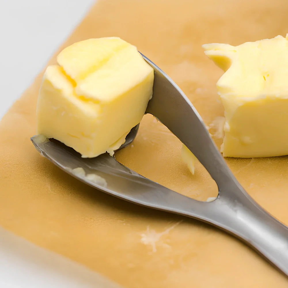 Stainless steel butter cutter with 12cm blade and 60 degree tip angle