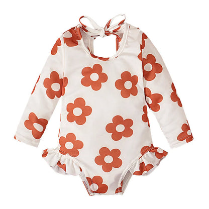Girl's floral print swimsuit with open back crew neck design in polyester fabric
