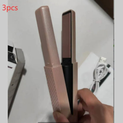 Pink and green cordless mini USB hair straightener and curler with ceramic plates.