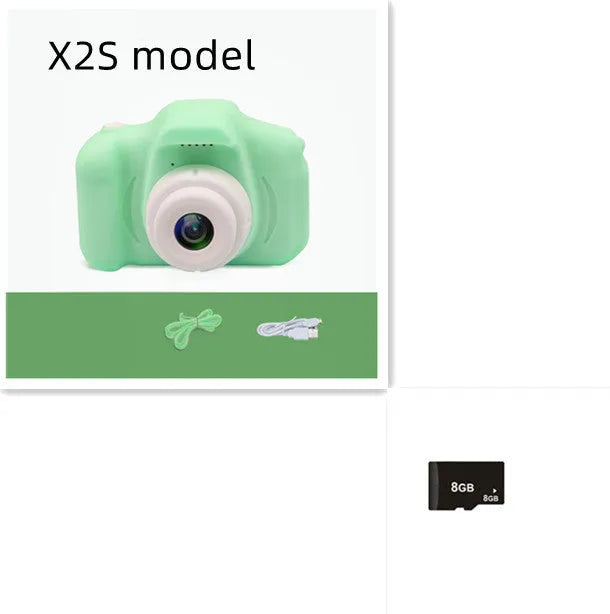 X2 HD mini digital camera for kids in silicone case with lanyard, shown capturing photo on 2-inch screen.