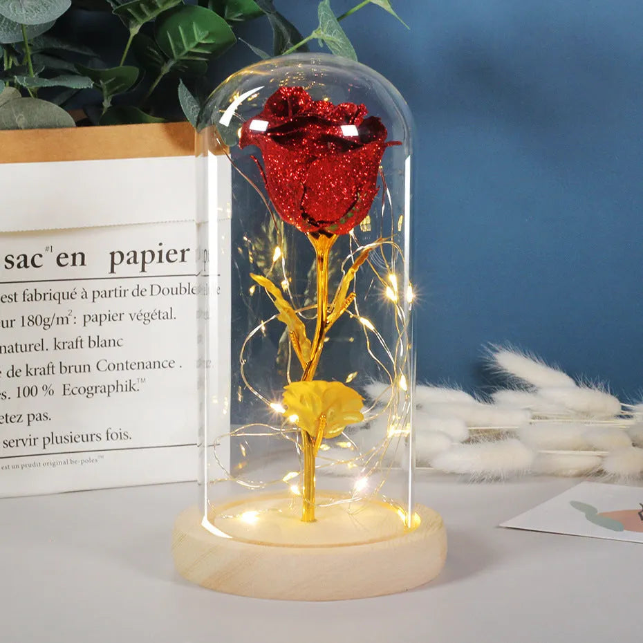 Eternal rose in glass dome with LED string lights, colour options include red, gold, grey, rose red, blue, pink