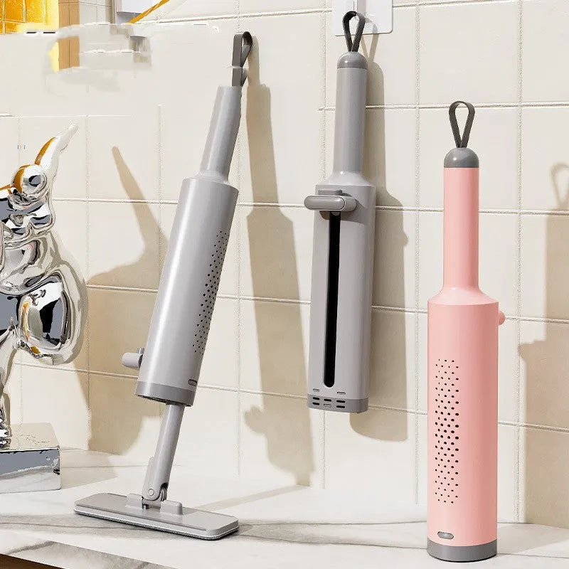 Rotatable self-squeeze mini mop with crevice brush attachment and microfiber pads for compact floor cleaning