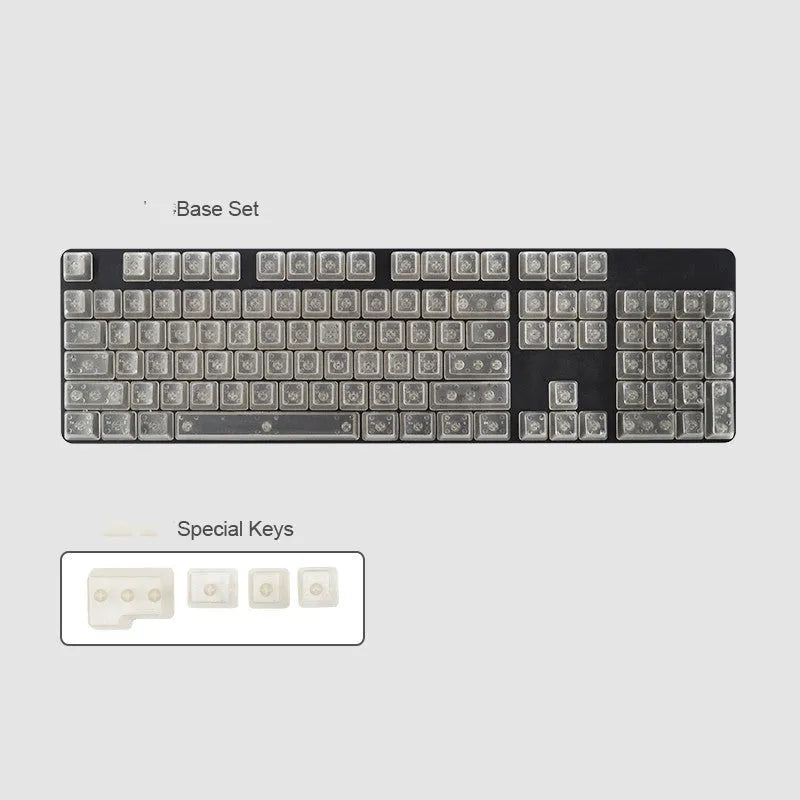 Set of 104 transparent PBT mechanical keyboard keycaps in orange, white, blue, and black colours on a black background.