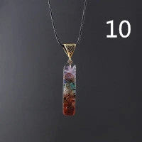 Handcrafted natural crystal seven chakra pendant with unique geometric design