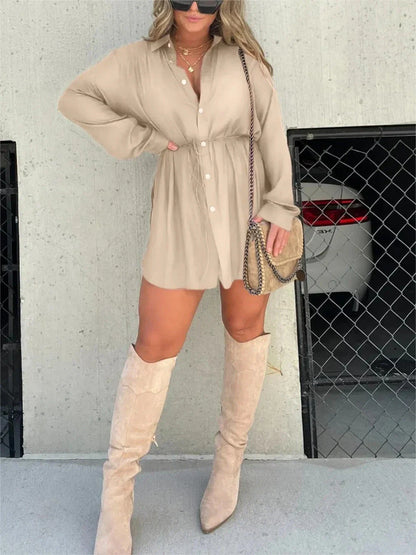 A stylish long sleeve jumpsuit with a button-up shirt design, available in a variety of vibrant colors.