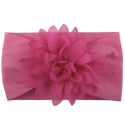 Handcrafted chiffon flower baby headband for little princesses, available in various colours and styles.