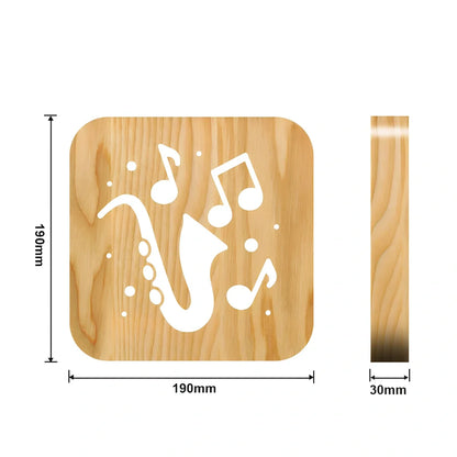 3D wood carving LED night light depicting musical instruments with USB power cable