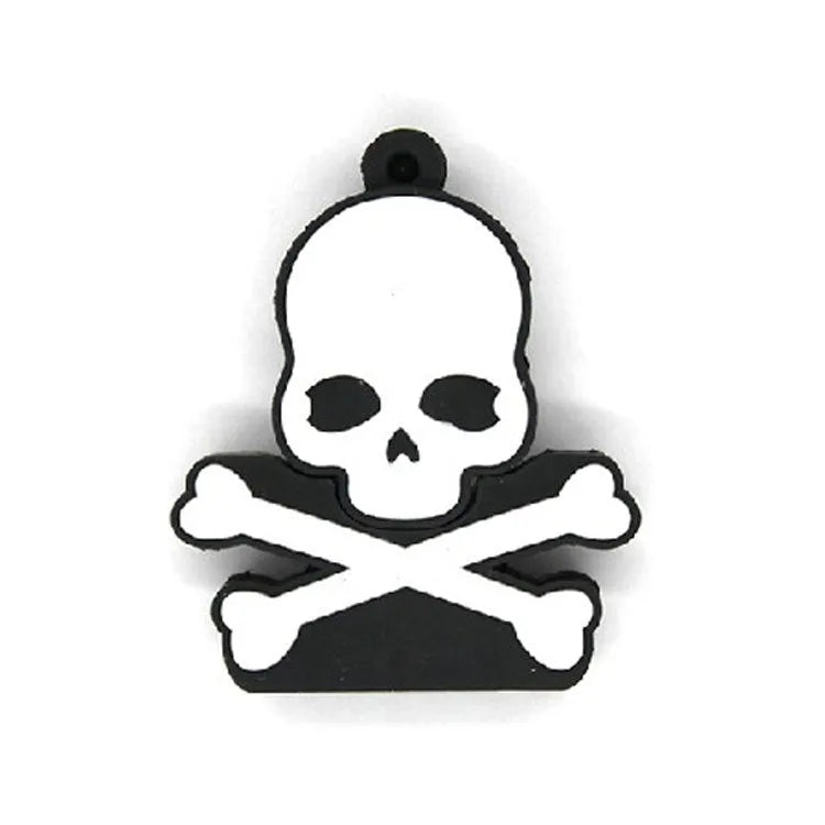 Skull-shaped black USB flash drive on a small metal keychain against a dark background.
