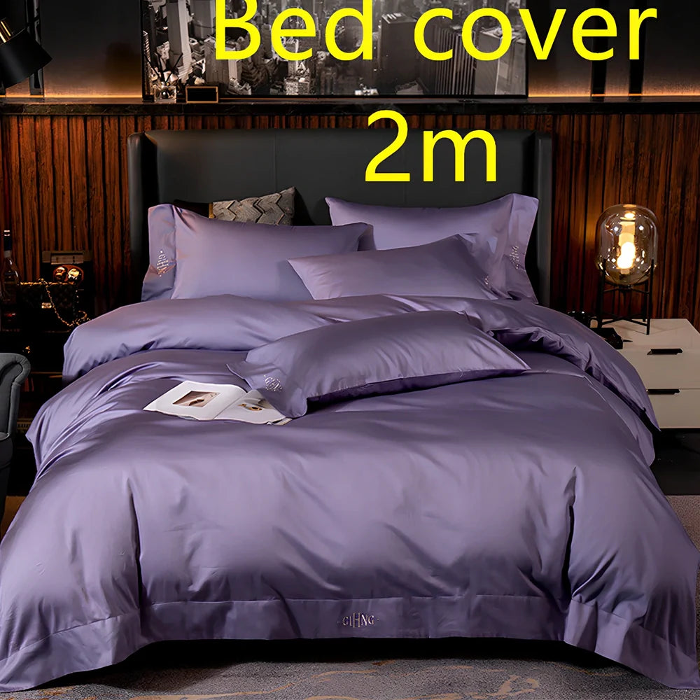 Four-piece cotton bedding set with satin weave fabric showing quilting detail and colour options