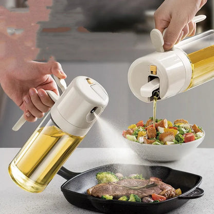 Warm grey glass oil sprayer bottle with a switchable nozzle for spray or pour modes.