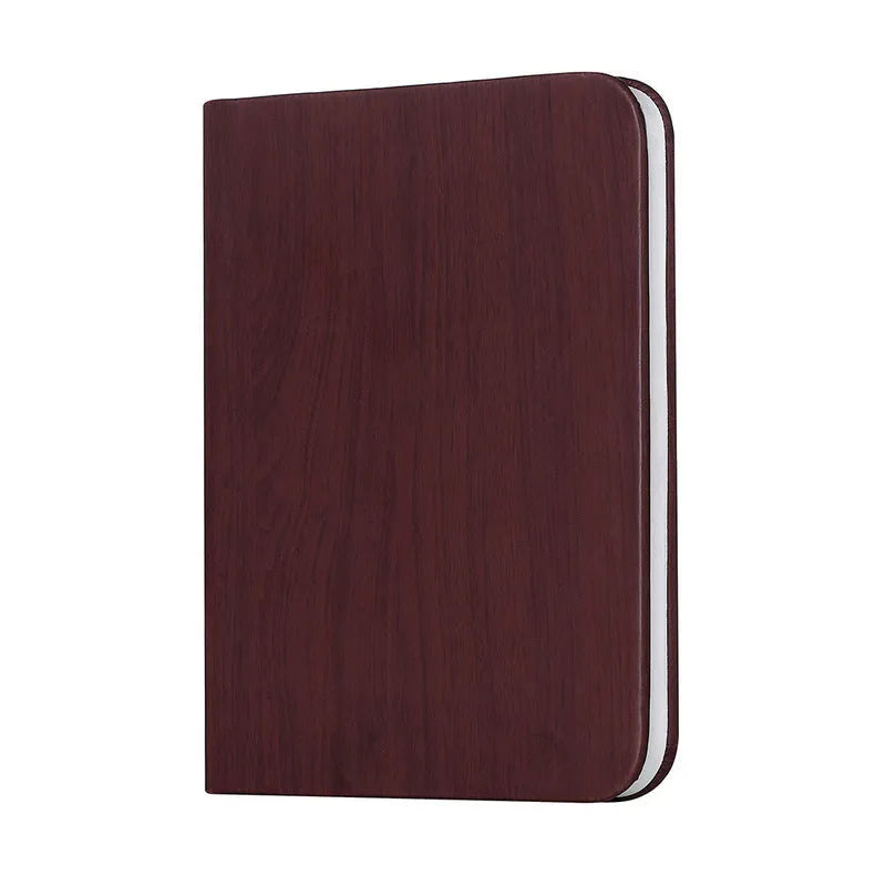 Modern wooden boy-shaped LED night light lamp on a surface in maple white, hu red, or hu black colour.