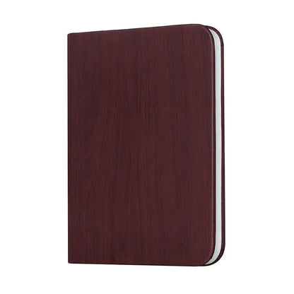 Modern wooden boy-shaped LED night light lamp on a surface in maple white, hu red, or hu black colour.
