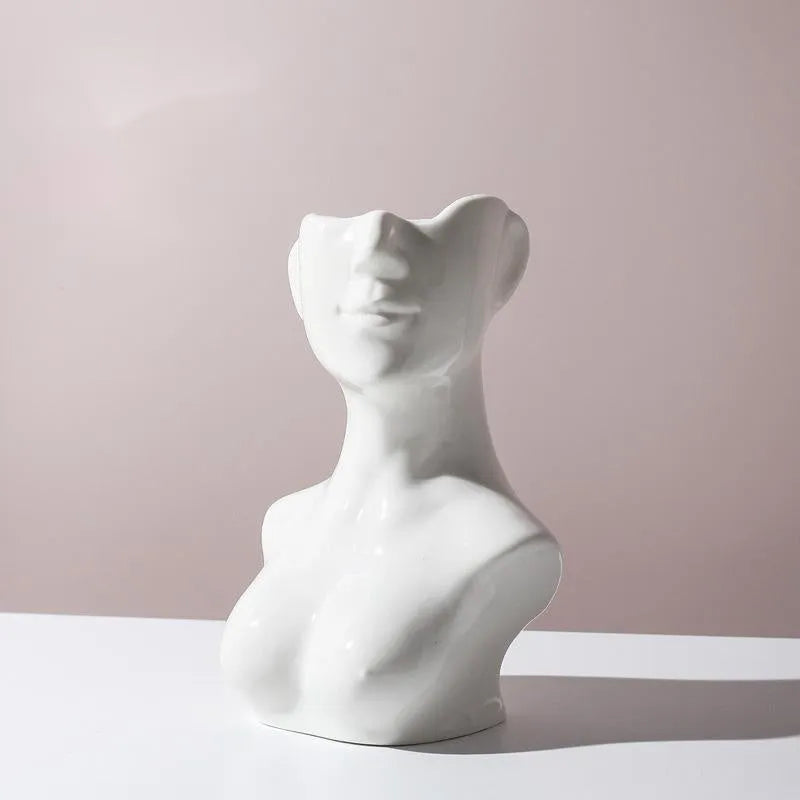 Human body shape ceramic vase with colour glazed finish in sculptural form