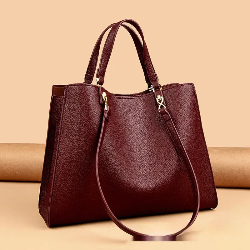 Women's messenger bag fashion tote with medium-soft PU construction, horizontal square shape, and single shoulder strap available in black, red, off-white, grey, khaki, and brown colour options