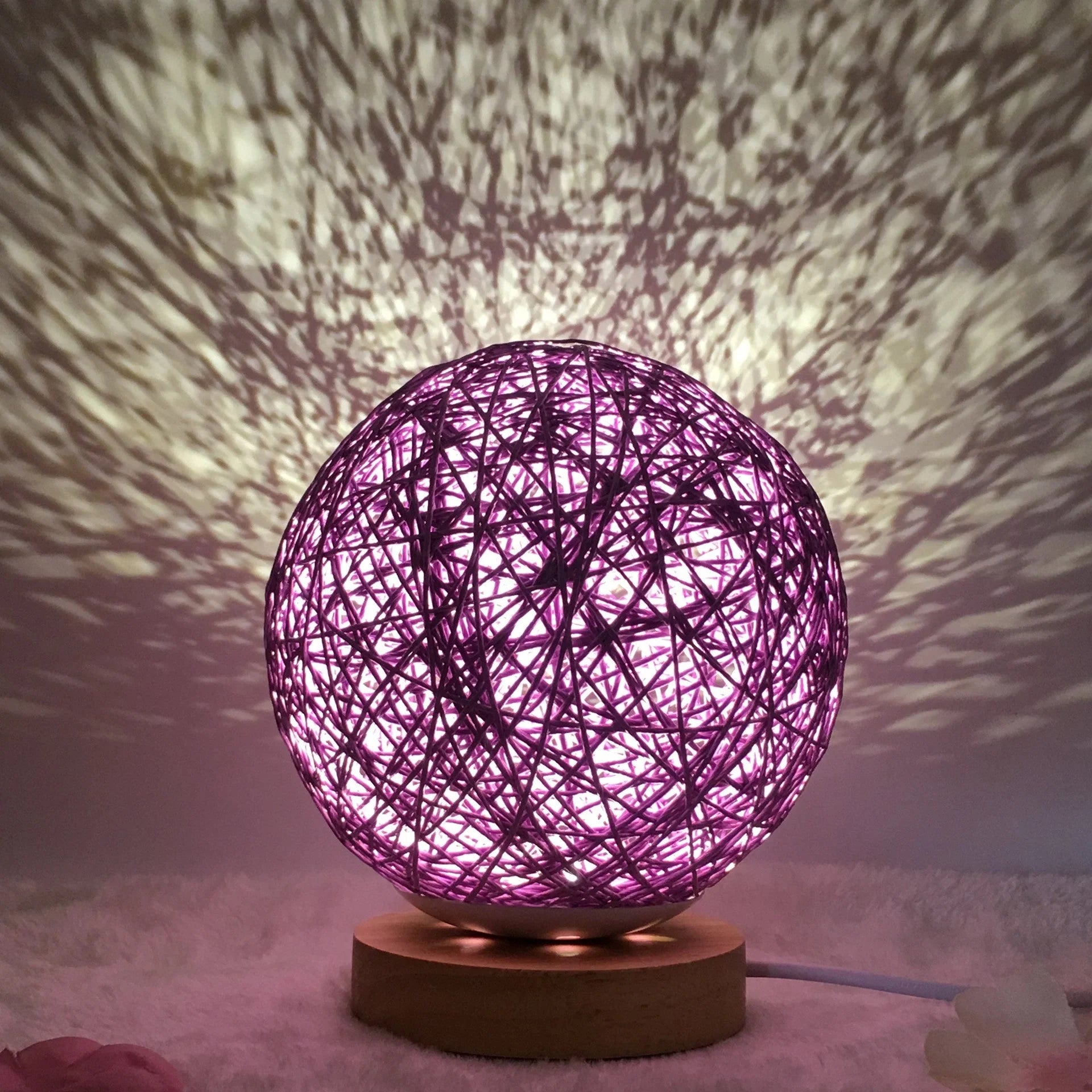 LED rattan table lamp with hand-knit linen shade in various colours