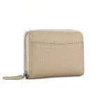 Genuine leather zipper coin purse in a solid colour showing sewing line detail.