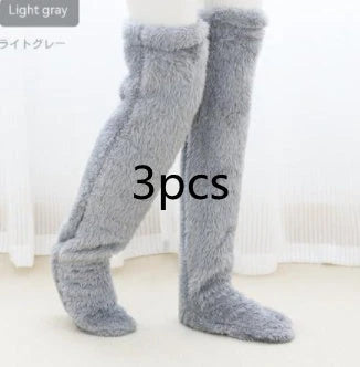 Cozy over-the-knee fuzzy socks in a variety of colors for winter warmth and comfort