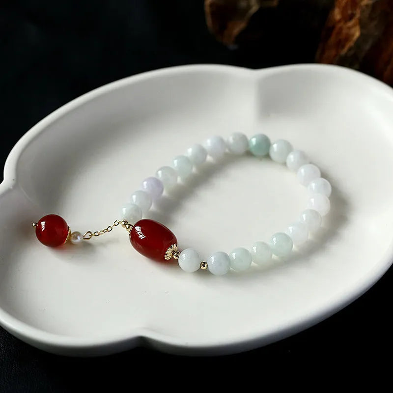 Geometric women's bracelet with hanging agate tassel and 14K gilded elements