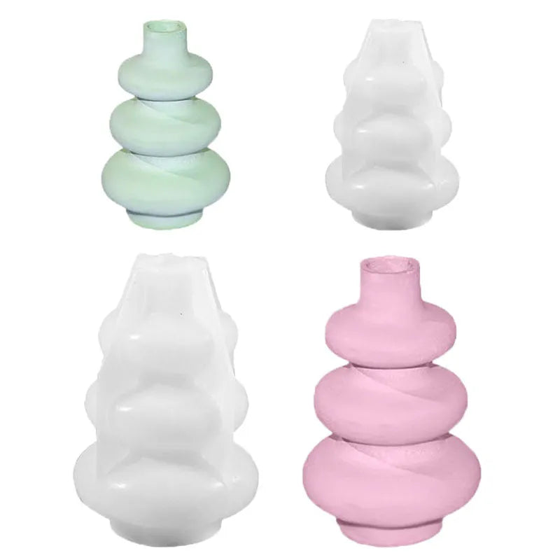 Silicone baking mould in shape of three-layer irregular circle vase on white background