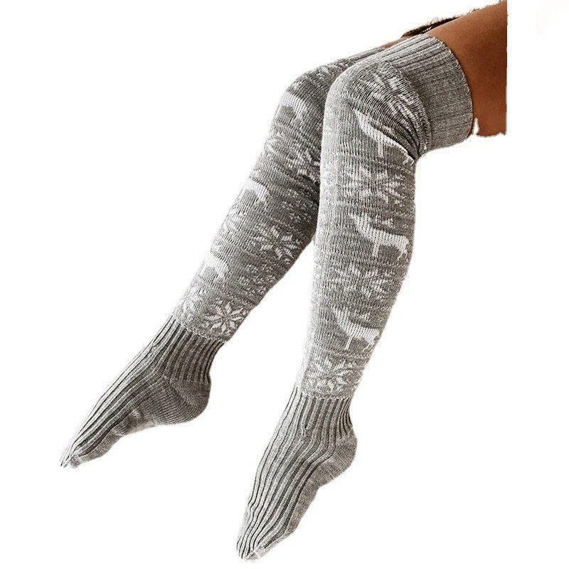 Cozy Christmas knee-high socks with festive elk and snowflake patterns