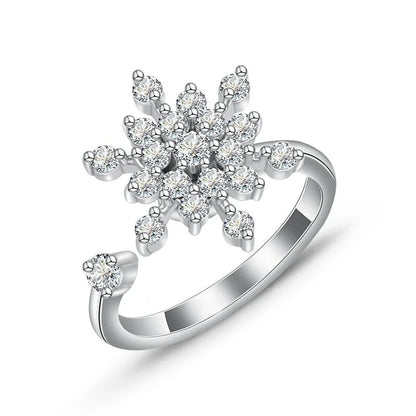 Adjustable spinner ring with rotating floral, geometric, and nature-inspired motifs for women's fashion and stress relief