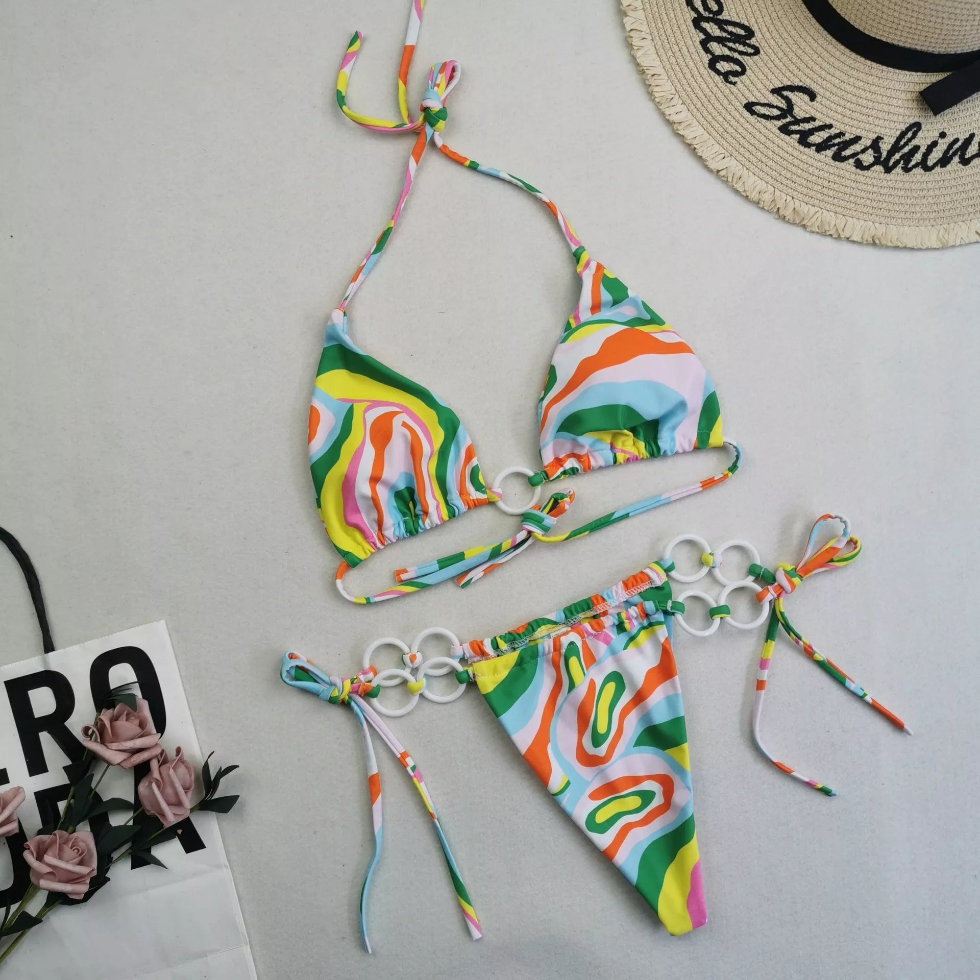 Women's split bikini with lace-up design and double fabric in various colours