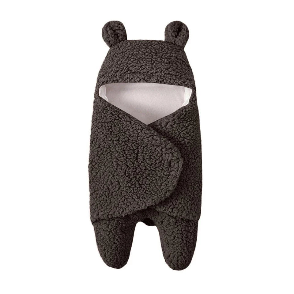 Cozy cotton baby sleeping bag with soft, breathable interior and warm, insulating outer layer