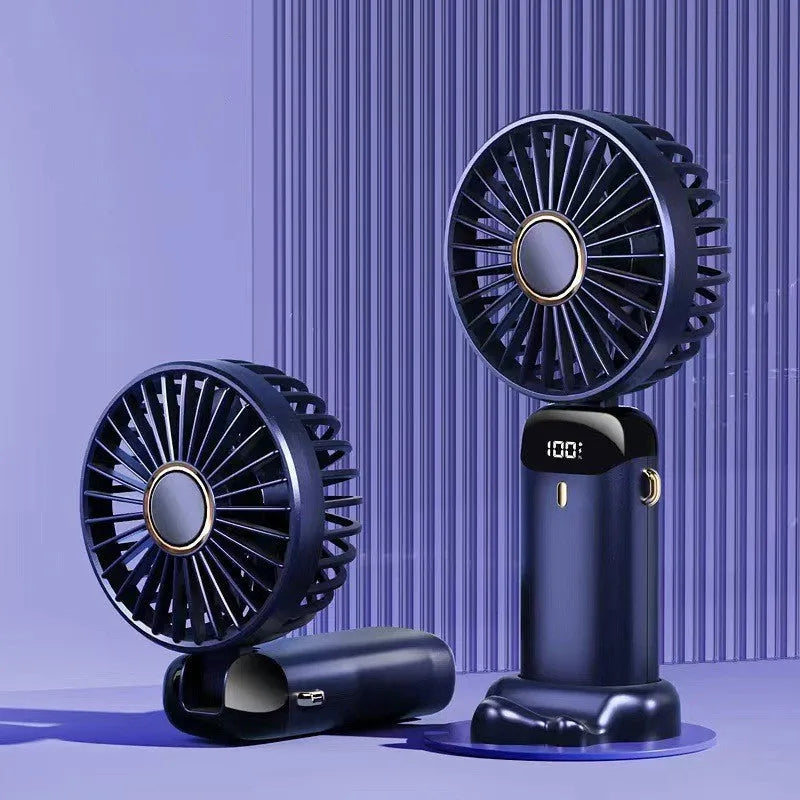 Blue foldable mini handheld electric fan showing its LED display and hanging lanyard.