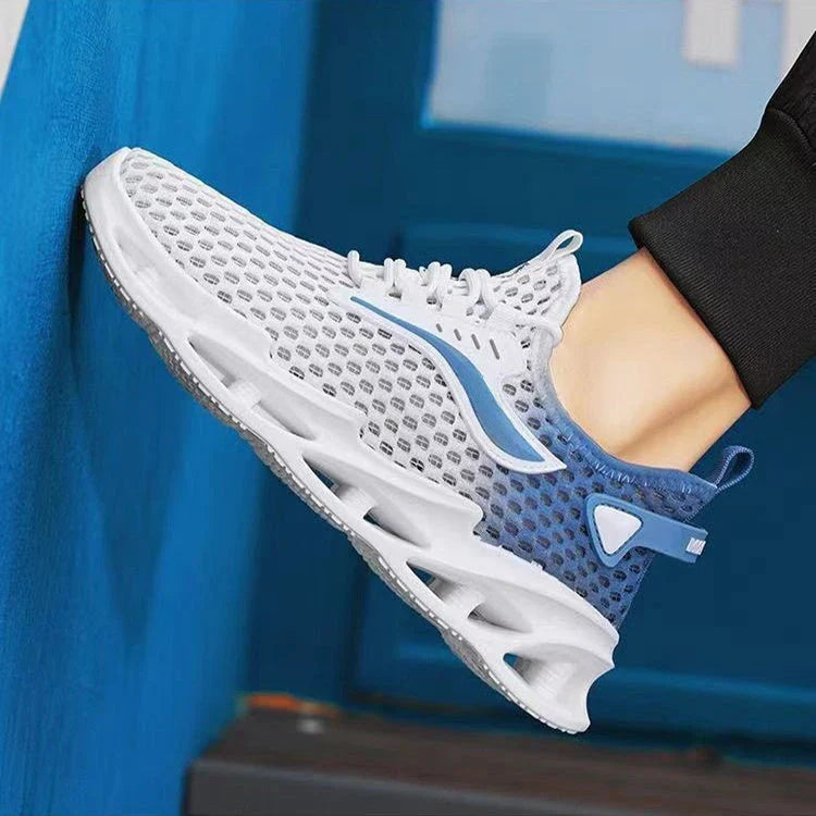 Breathable mesh running shoes with lace-up closure, available in black, white blue, and white grey colors