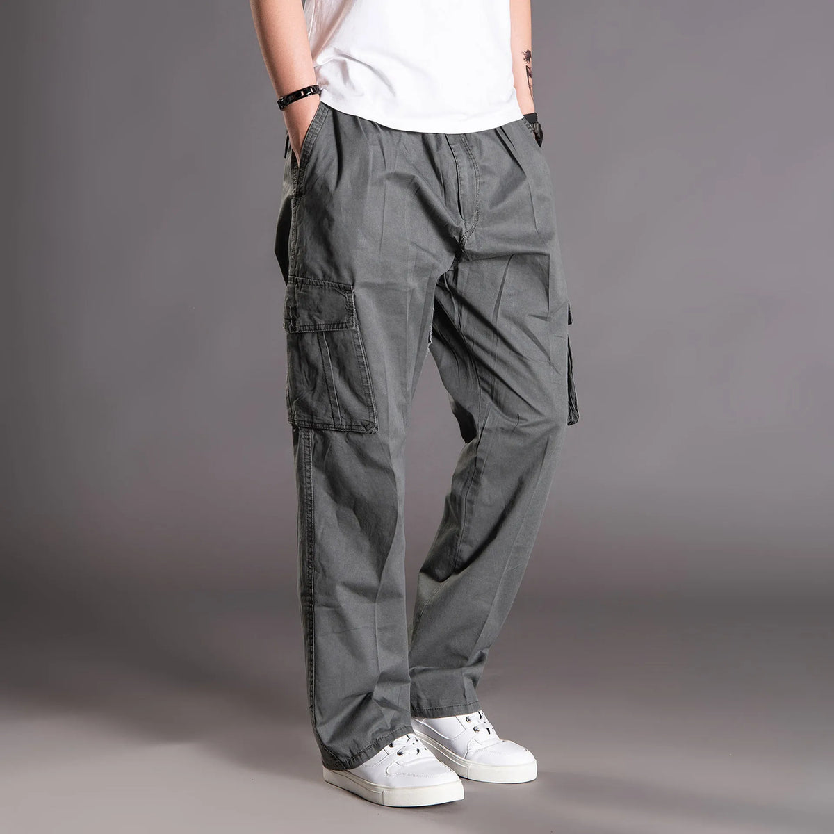 Loose straight leg cotton cargo trousers with multi-pocket, mid waist, zip placket, in black, army green, khaki, or natural yellow.