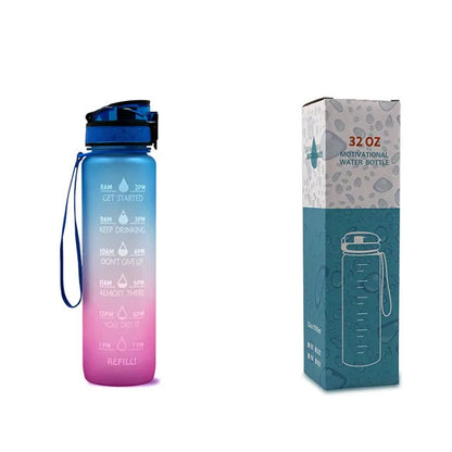 Blue and red gradient 1 litre Tritan sports water bottle with time markers and a flip-top lid.