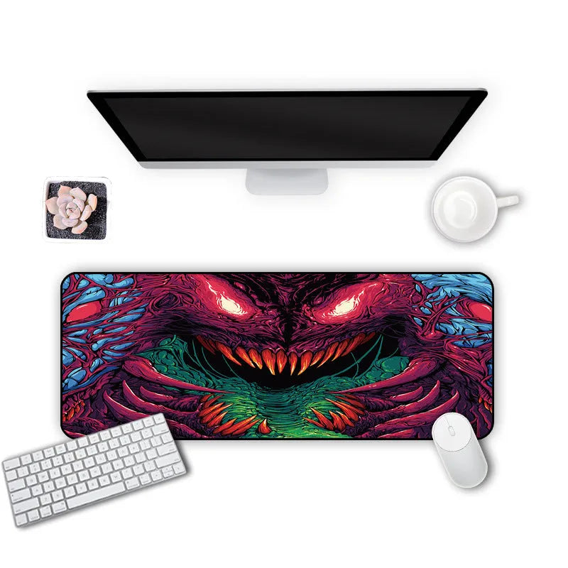 Oversized mouse pad with non-slip rubber base and washable cloth surface, available in multiple sizes and 2mm or 3mm thickness.