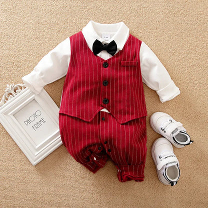 Wine red long sleeve cotton romper for a baby boy on a hanger.