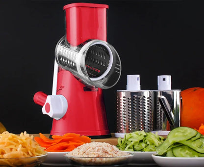 Blue multifunctional round mandoline vegetable slicer and cheese grater with stainless steel blades on a kitchen counter.