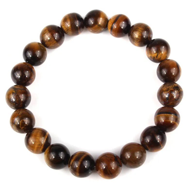 Natural tiger eye crystal bead bracelet showing round geometric beads on a wrist, available in multiple sizes and colour variations.