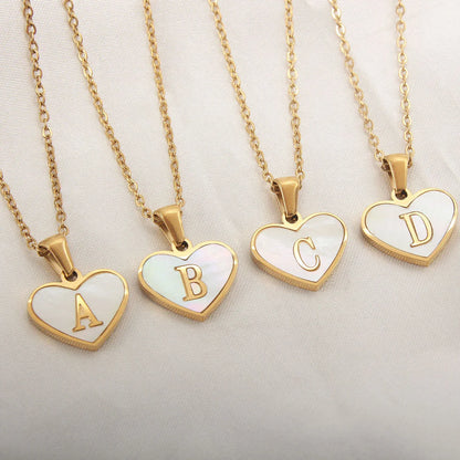 Personalized heart-shaped white shell necklace with adjustable clavicle chain, a stylish and versatile jewelry piece for women