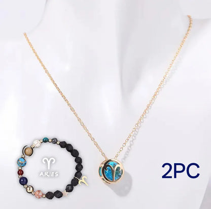 A natural stone beaded necklace and matching bracelet set laid flat, showcasing varied bead colours and textures.