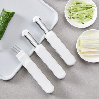 3-in-1 Multifunctional Rotary Paring Knife with stainless steel blade and white handle
