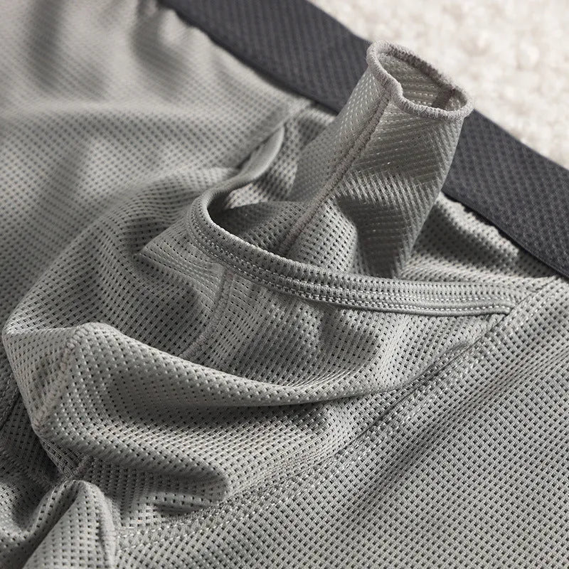 Men's ice silk boxer shorts in nylon mesh fabric showing low-waist design