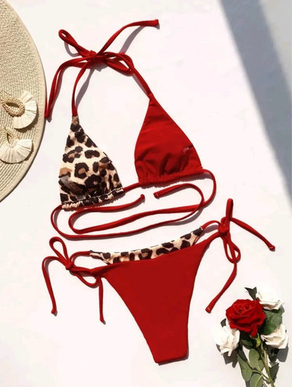 Women's leopard print halter neck bikini with front lace-up closure in black colour