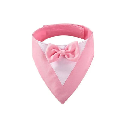Triangular pet bib with bow detail in assorted colours, shown on a dog as a scarf and drool towel.